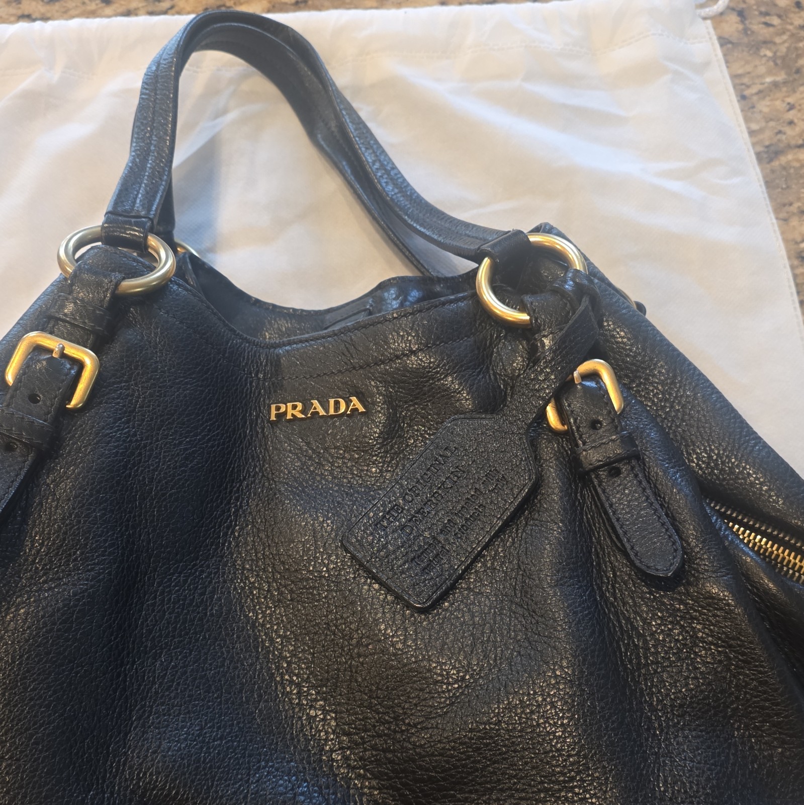 PRADA Black Pebbled Shoulder Bag Gold Hardware Logo Luggage Tag Zip Pockets