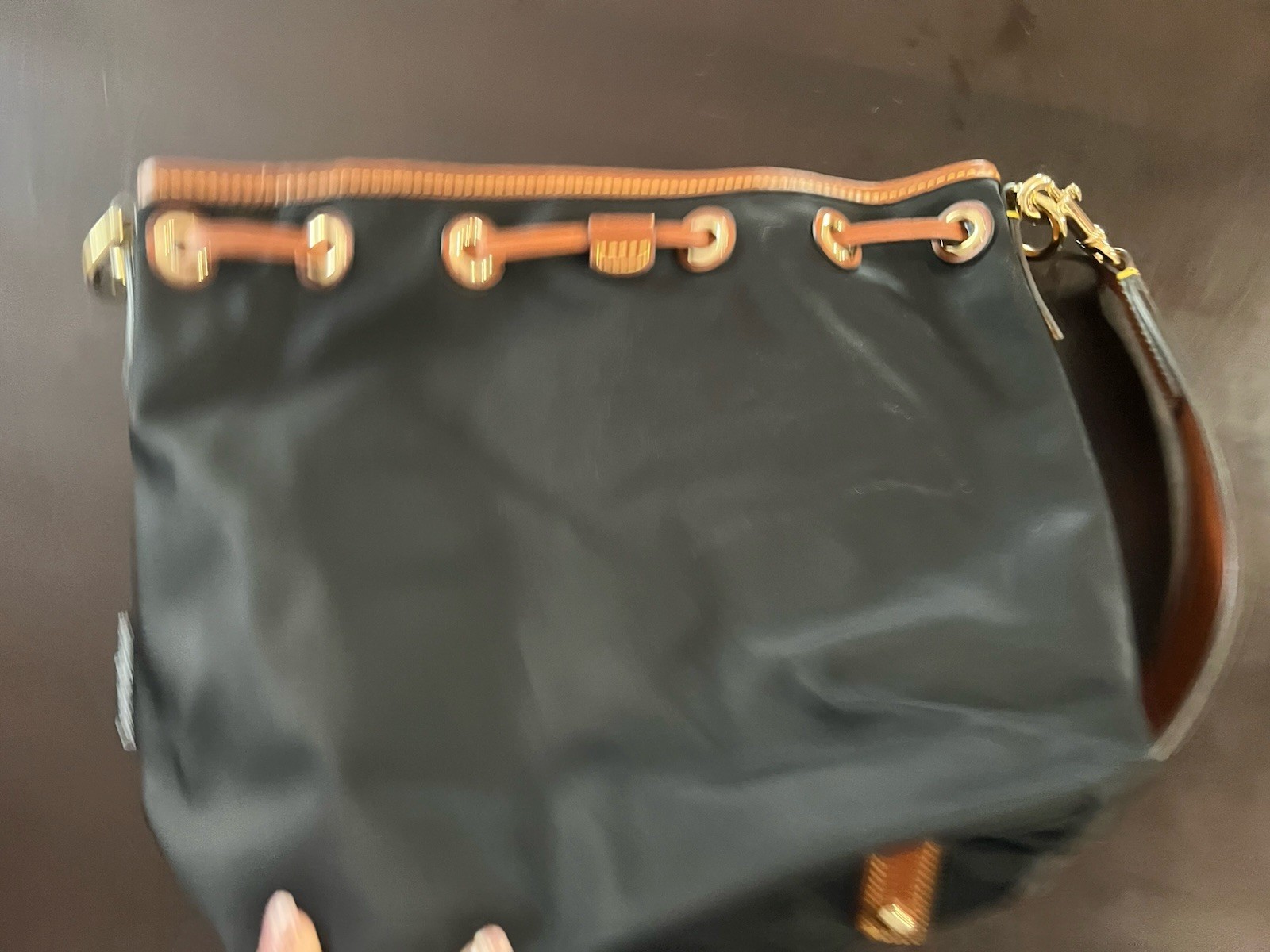 Dooney & Bourke Black Bucket Bag with Brown Leather Trim & Detachable Strap