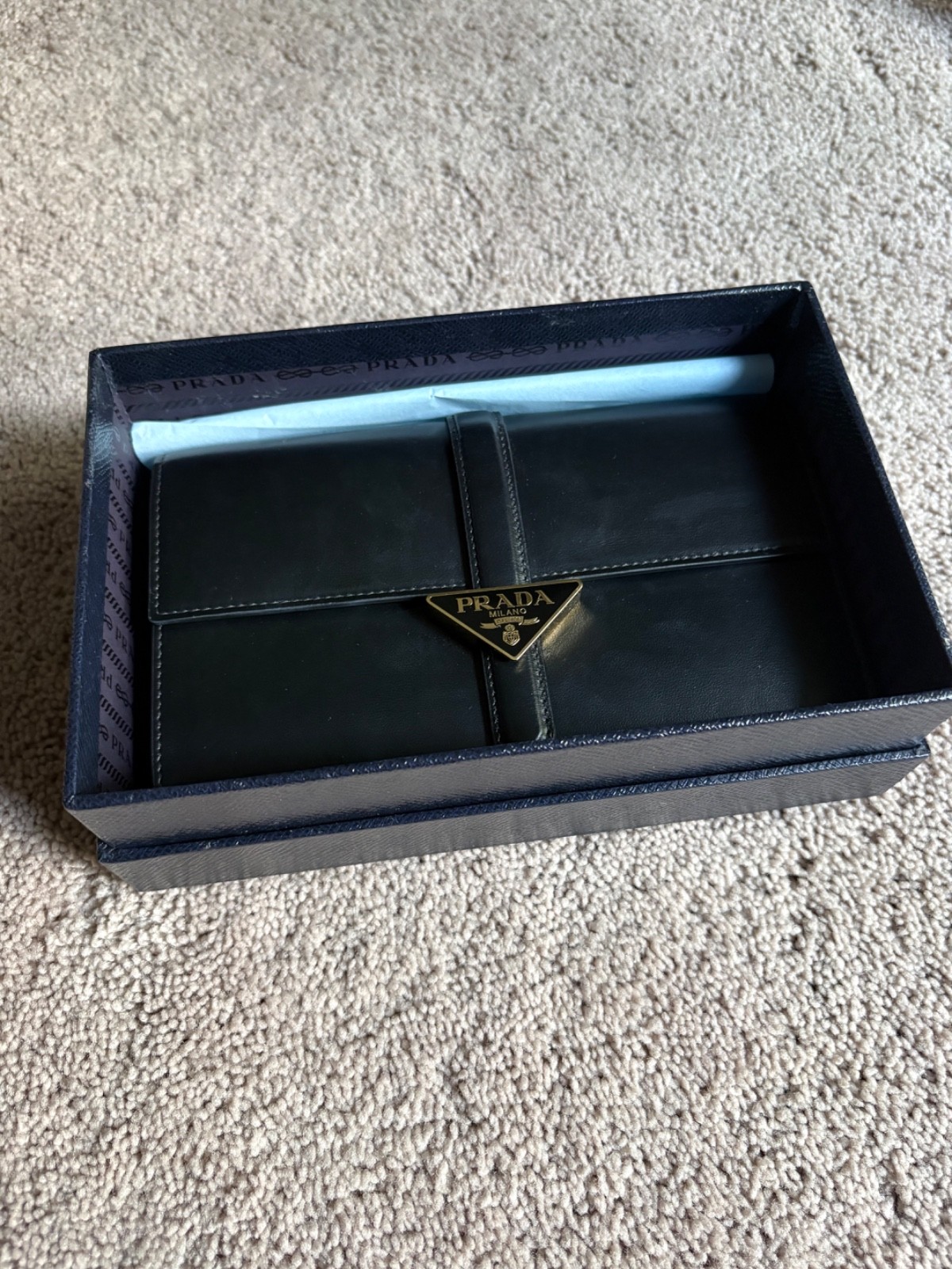 Italian Prada Clutch Brand New with original packaging, card of authenticity, et
