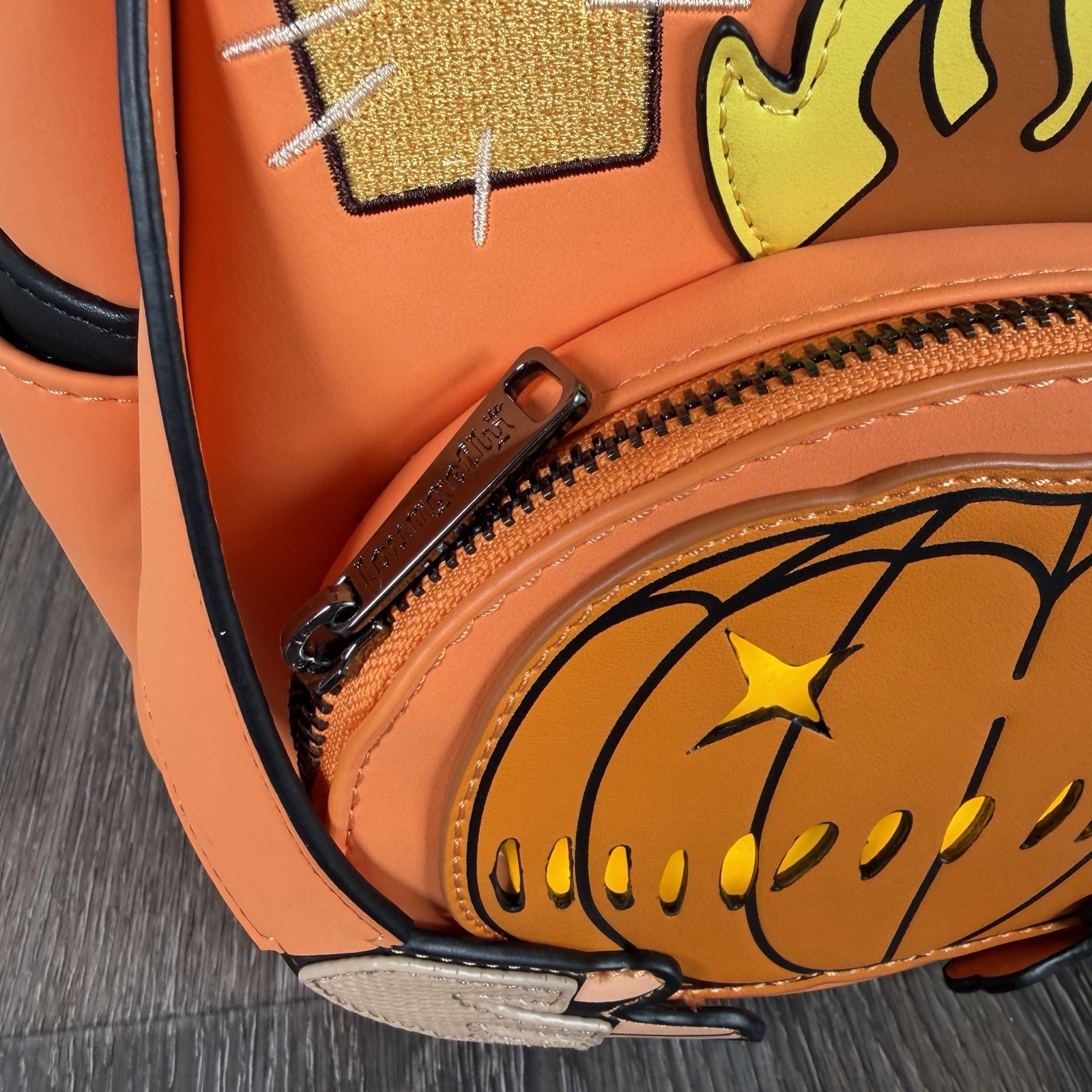 Loungefly Trick ‘R Treat Flaming Pumpkin Head Sam Light Up Glow Mini Backpack