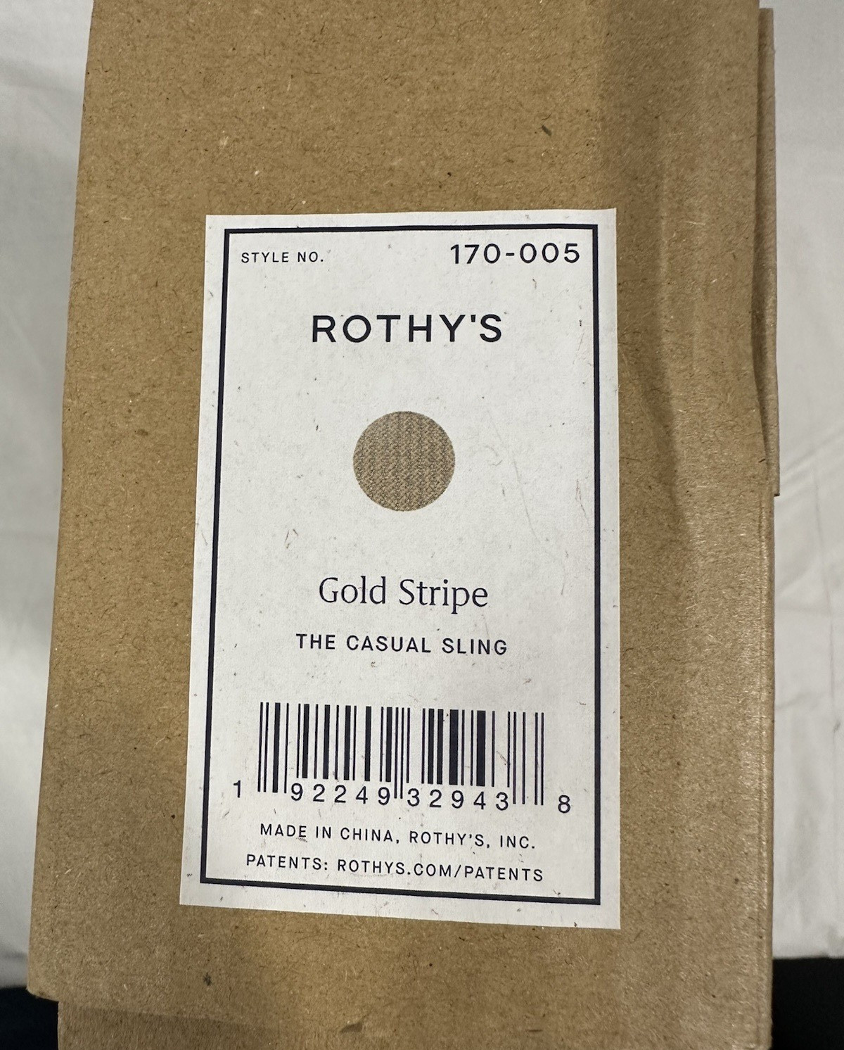 Rothy’s The Casual Sling Gold Stripe Bag