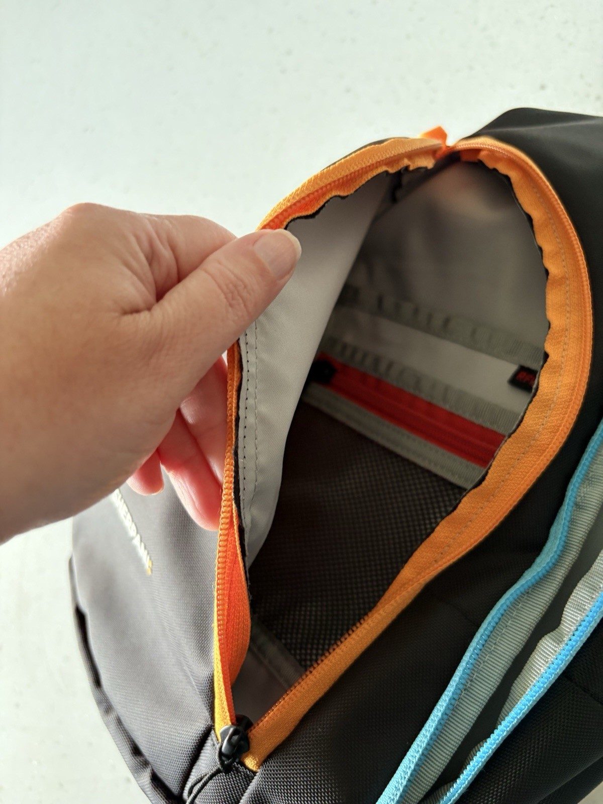 Sherpani Sling Bag RFID Blocking, Black w/ Blue & Orange Zippers, Travel