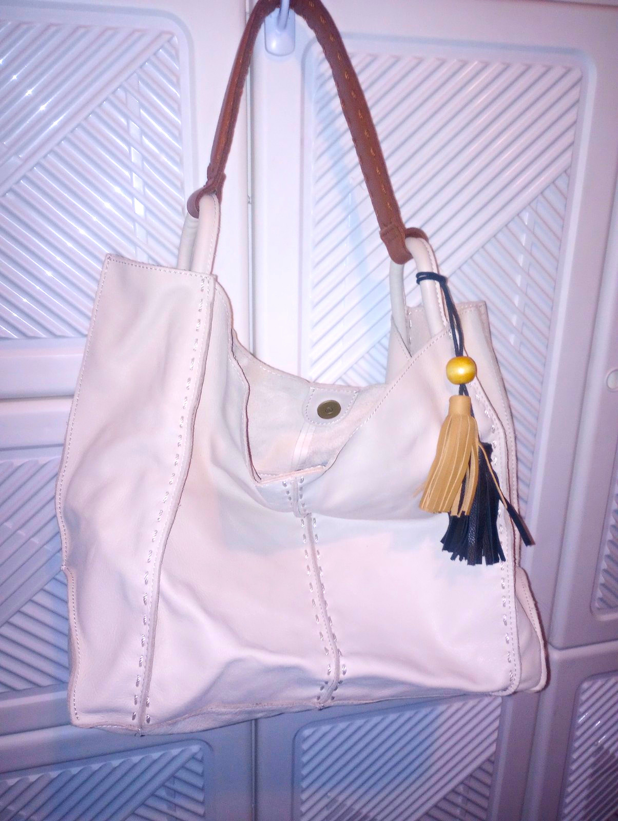 The Sak Ivory Shoulder Bag Brown Strap Tassel Charm Magnetic Zip Inner Pockets