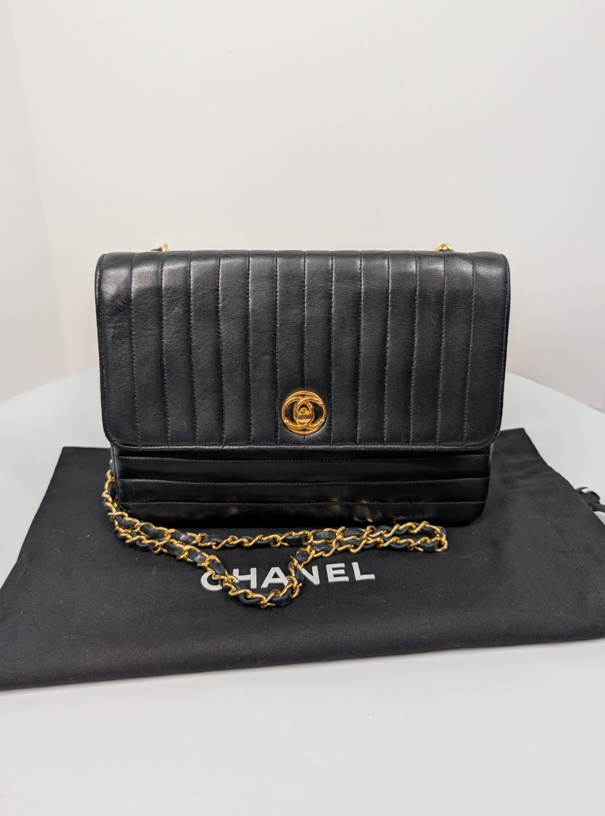 Chanel Vintage Black Vertical Stitch Flap Bag with Circle 24K Gold CC Turn-Lock