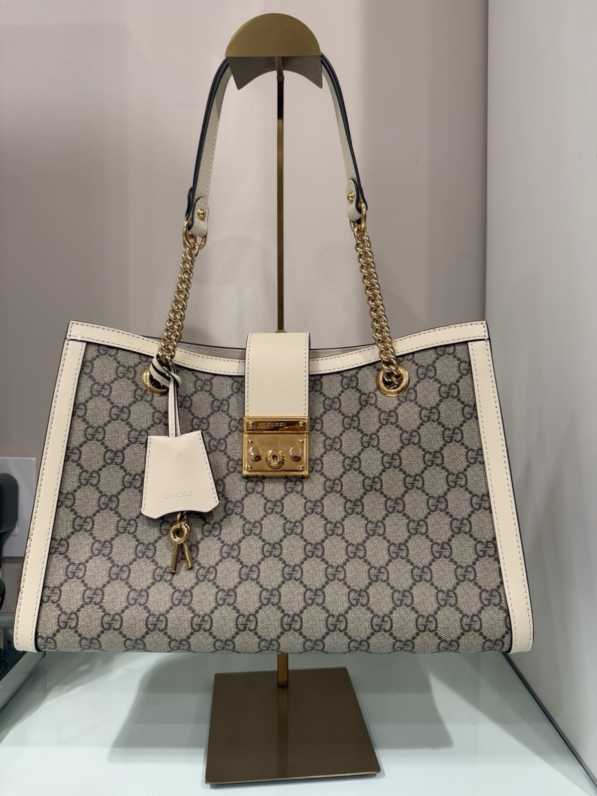 Authentic Gucci GG Supreme Monogram Moon Calfskin Medium Padlock Tote – Ebony