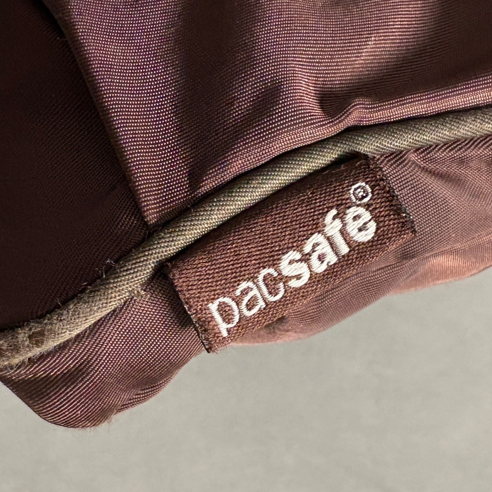 PACSAFE SlingSafe 100 Exomesh Anti-Theft Safety Crossbody Bag in Brown