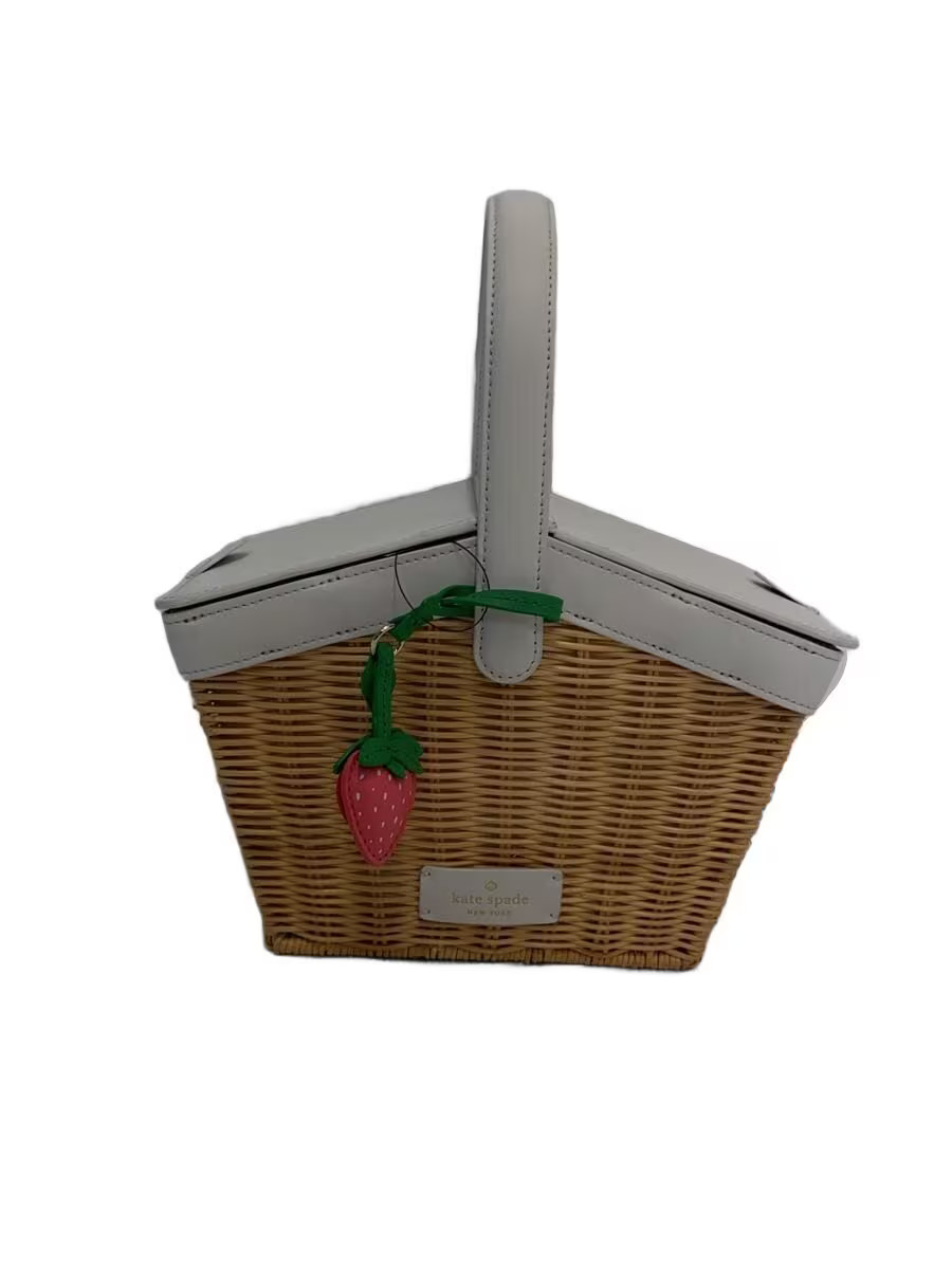 Kate Spade New York rattan basket bag with strawberry charm, plain beige color.