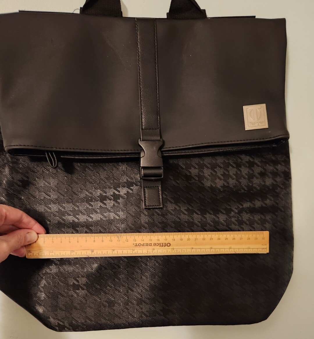 Tanger black houndstooth patterned backpack, looks new!