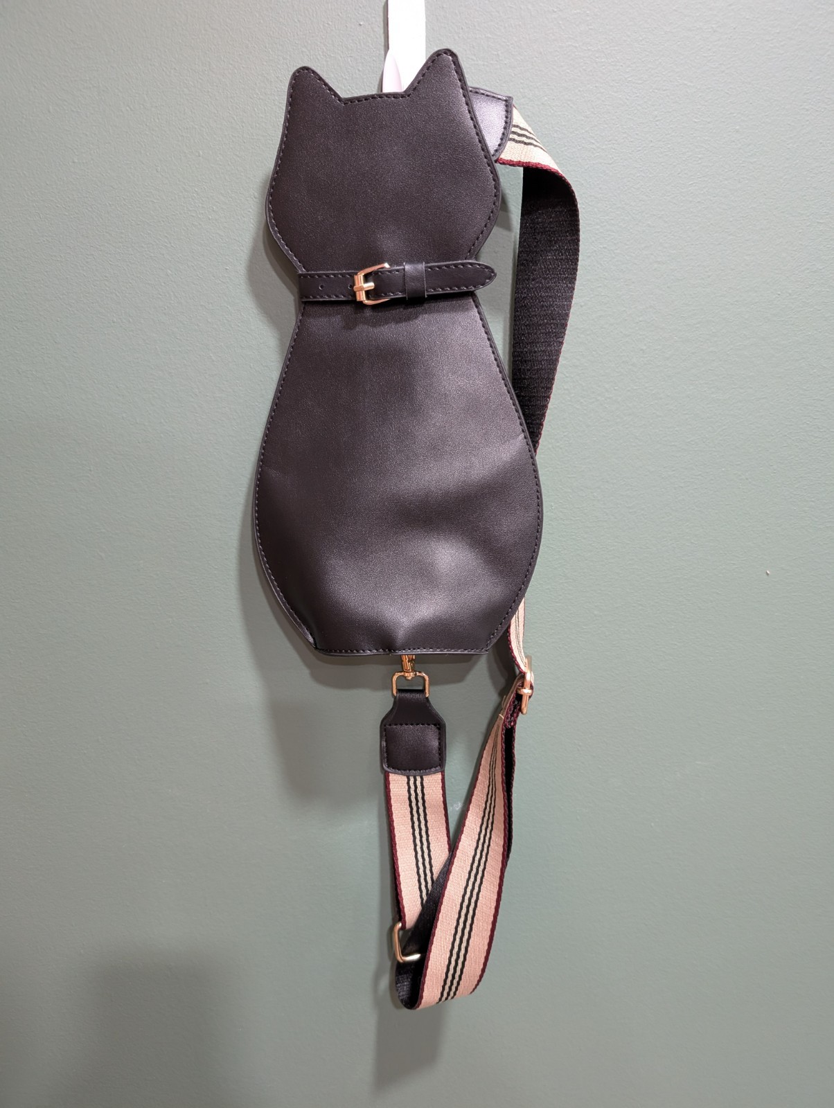 Black cat crossbody faux leather bag with adjustable shoulder strap good cond.