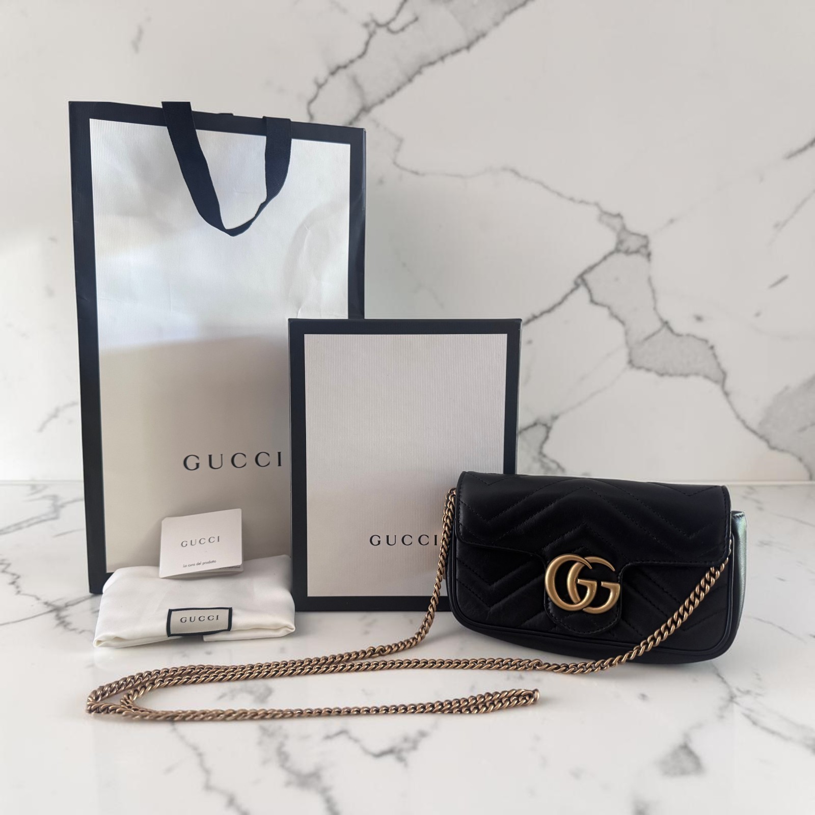Gucci GG Marmont Super Mini Black Chevron Leather Handbag Gold Chain GG Logo
