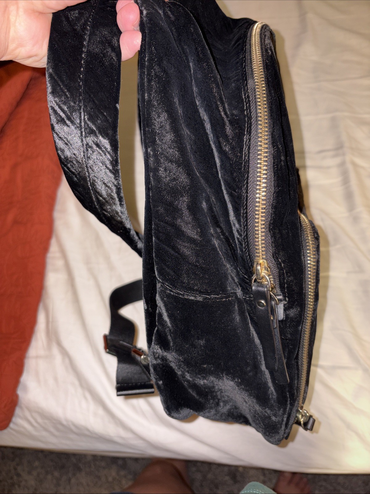 Kate Spade Hartley Black Velvet Backpack with gold zipper details