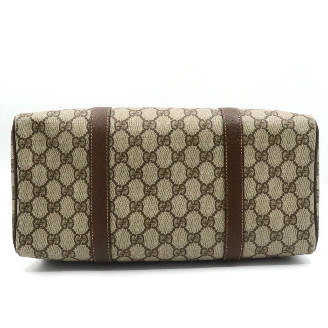 Gucci PVC canvas leather handbag, brown.