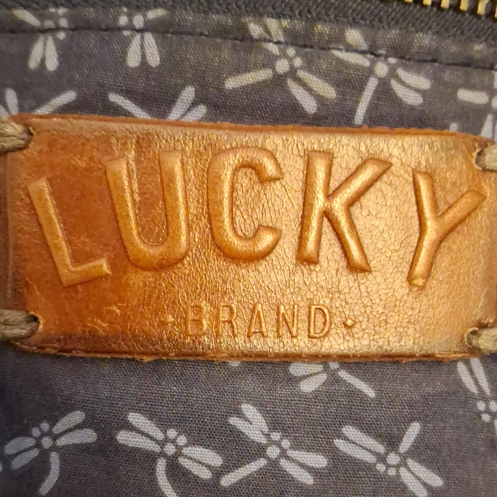 Lucky Brand Canvas Messenger Bag, Adjustable Strap And Interior Dragonfly Print.