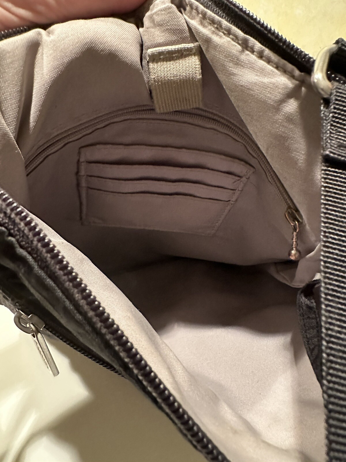 Baggallini black crossbody Purse Quilted Pocket On Front Pocket On Back