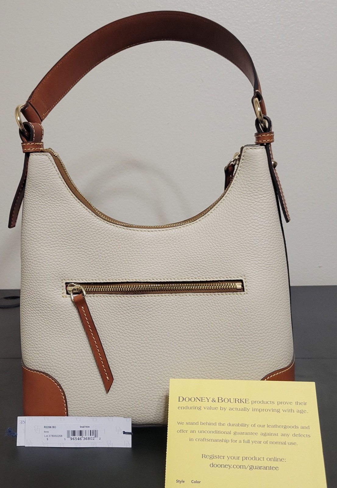 Dooney & Boorke Bag, New with dust bag, tags and registration/certification card