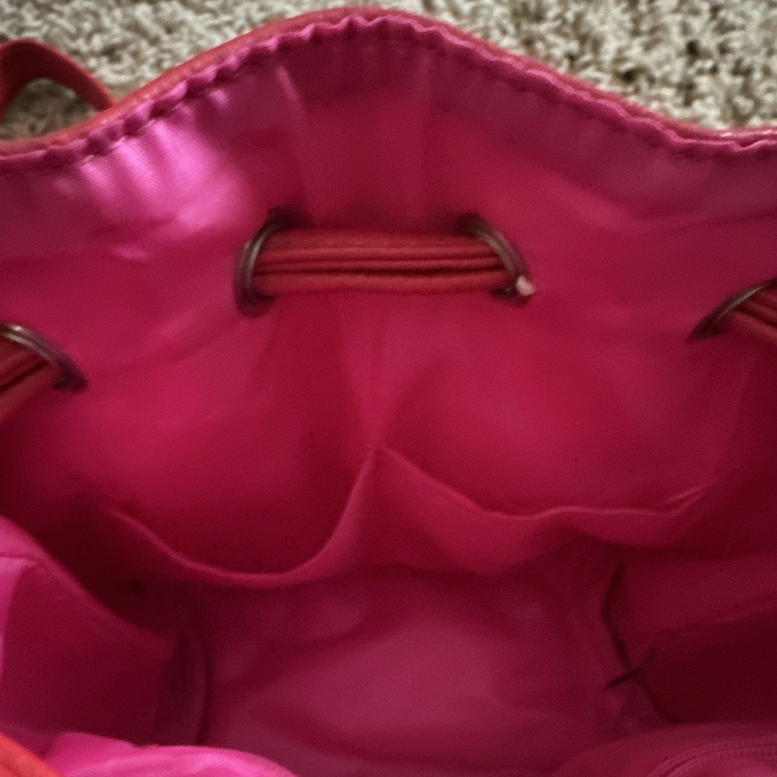 Tanger Outlets Red Pink Drawstring Bucket Bag with Tassel Accent for Women