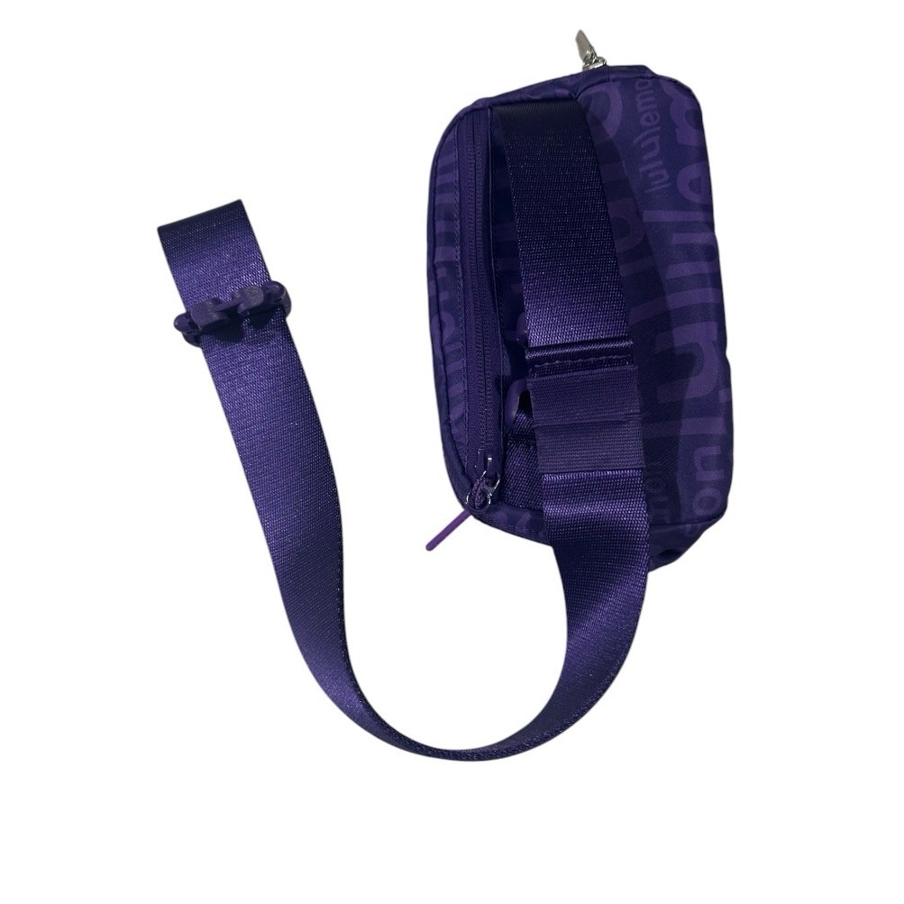 Lululemon Everywhere Belt Bag 1L – Atomic Purple Wobbly Word Graphic Crossbody