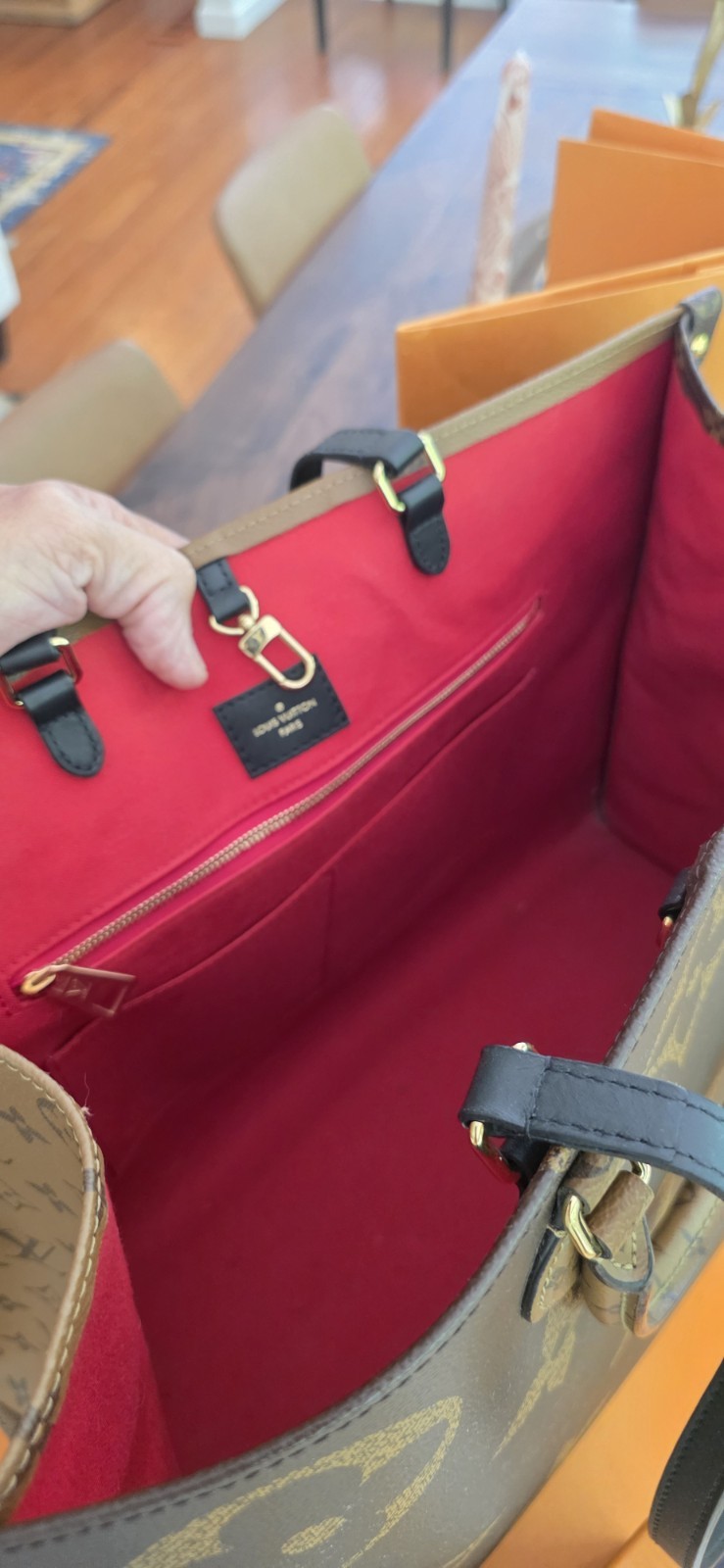 Louis Vuitton OnTheGo mm Reverse Monogram Leather Shoulder Bag.