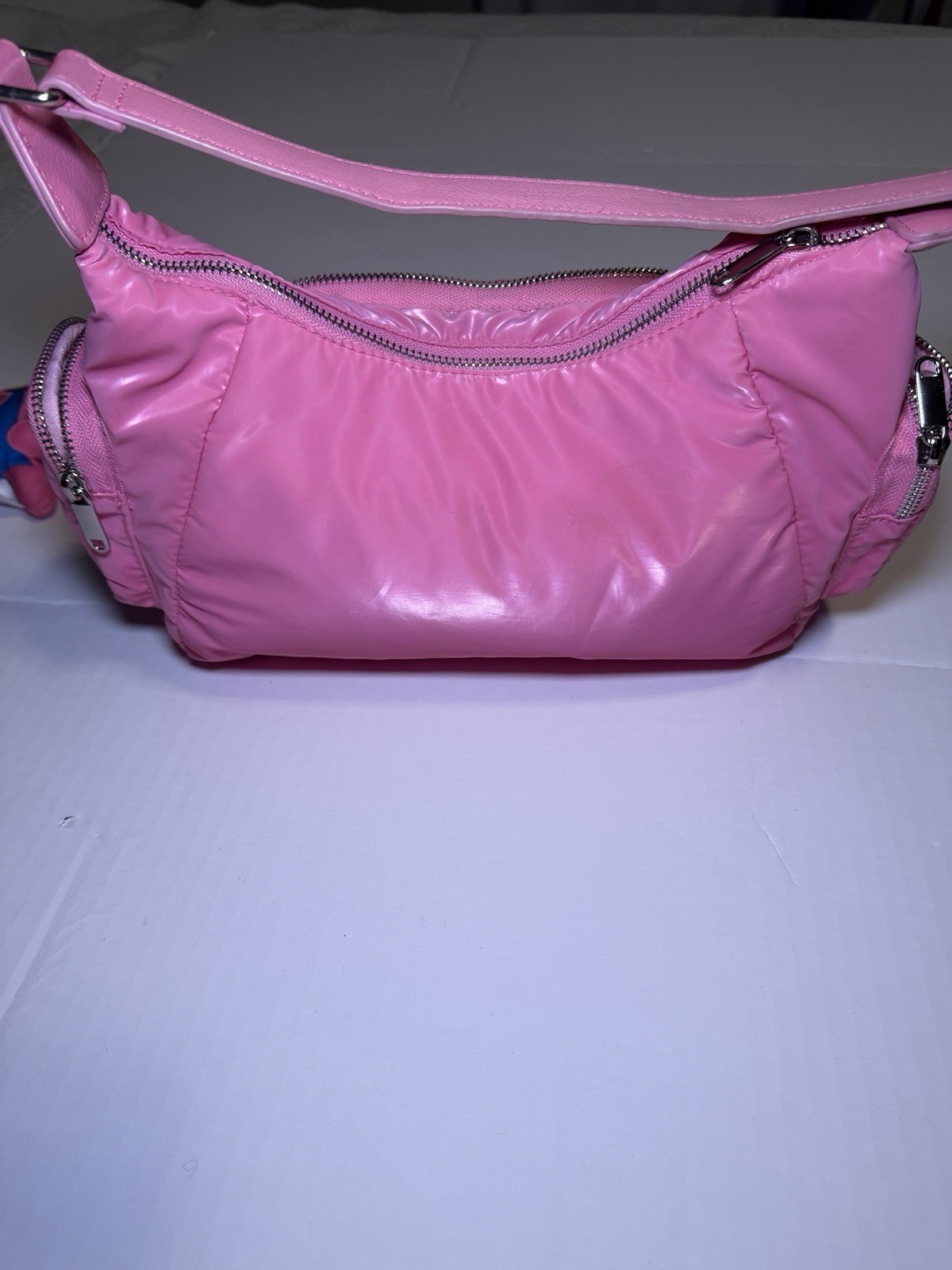 Pink faux patent leather handbag with Hello Kitty My Melody Dark Magician charm