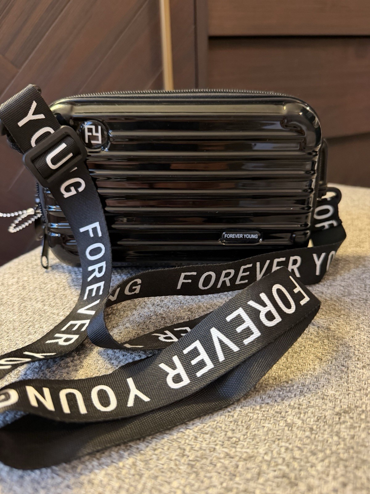 Forever Young Black Glossy Hard Shell Crossbody Bag Zip Closure Adjustable Strap