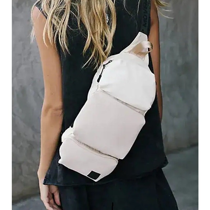 FREE PEOPLE MOVEMENT DRIBBLE POCKET SLING BAG in BONE NWT