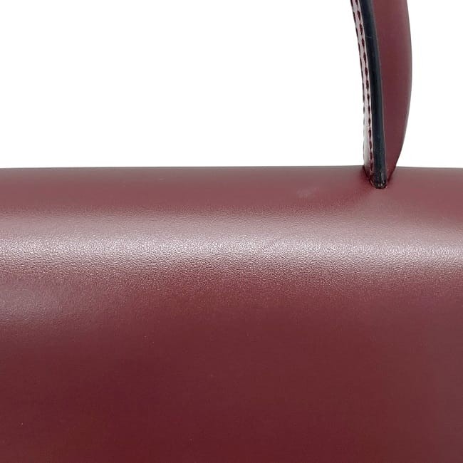 Pre-owned Cartier Bordeaux Must Leather Handbag, self-standing, wine-red, with