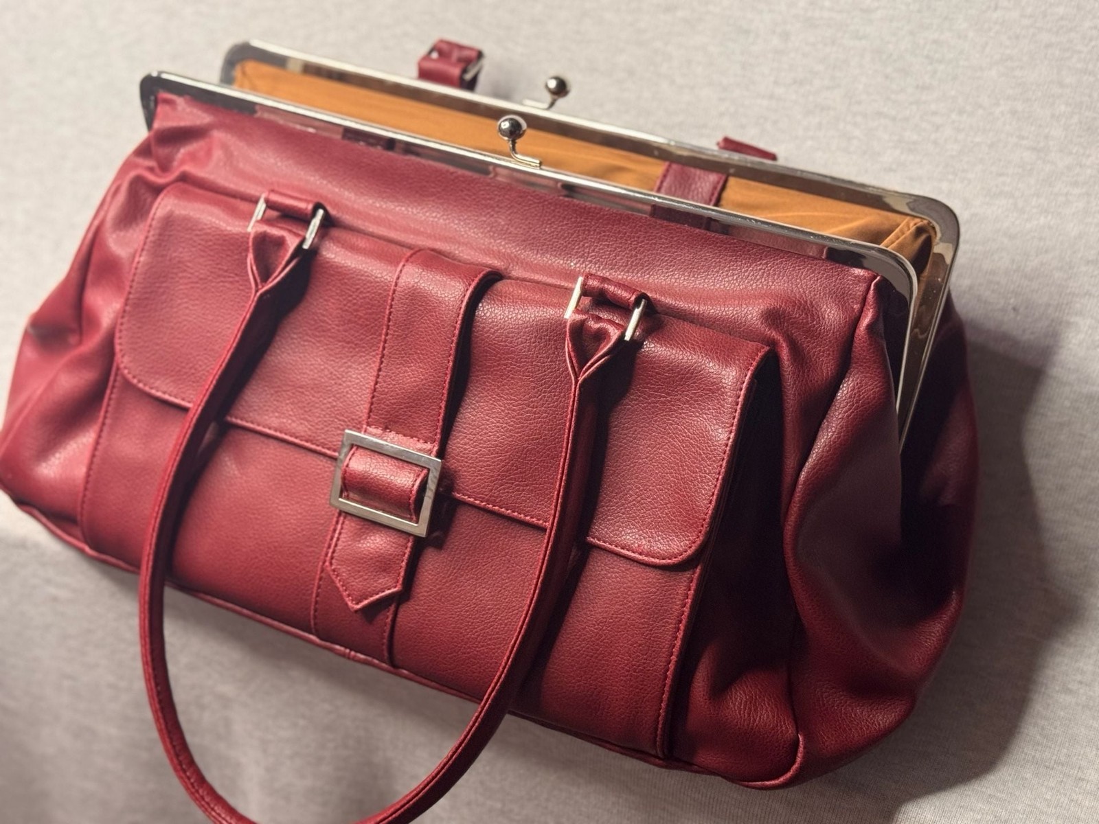 Jordana Paige red faux leather doctor style satchel with frame closure