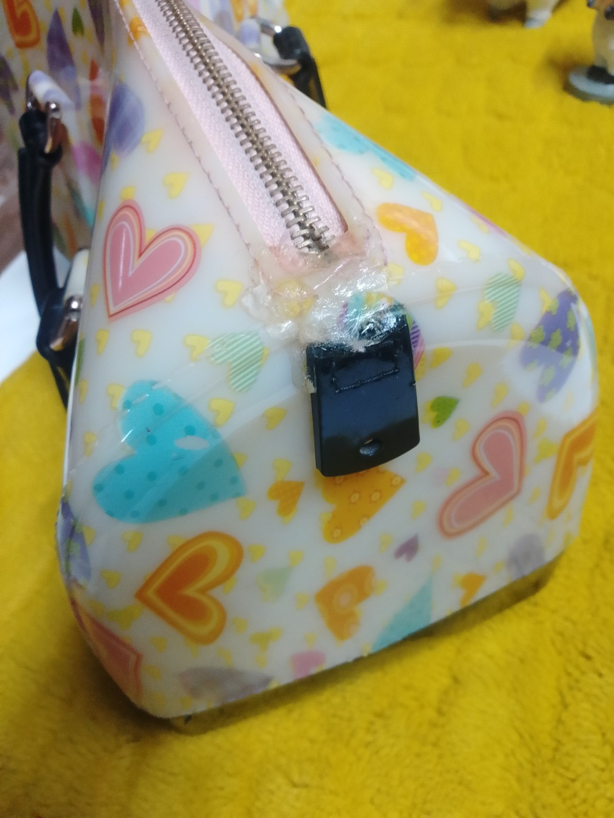 THE BAG IS A FURLA CANDY BAG [ LIMITED EDITION OR WITH A HEARTS PRINT ]