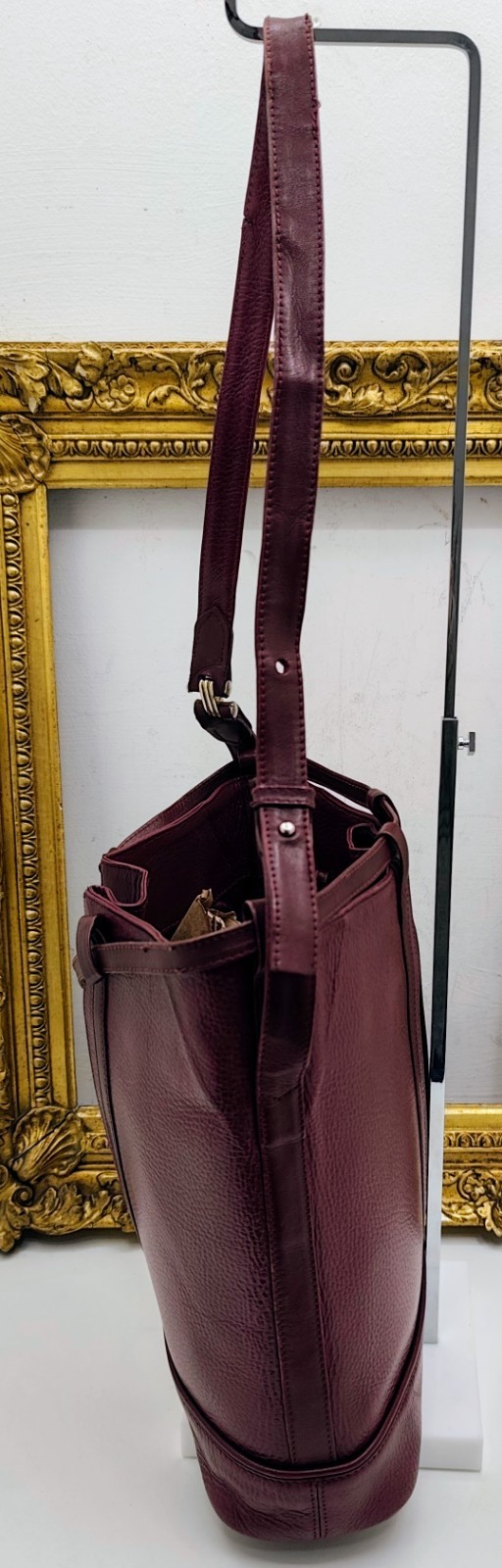 Cartier Oval Bucket Bag With Drawstring In Bordeaux Leather, 30x28x10 cm
