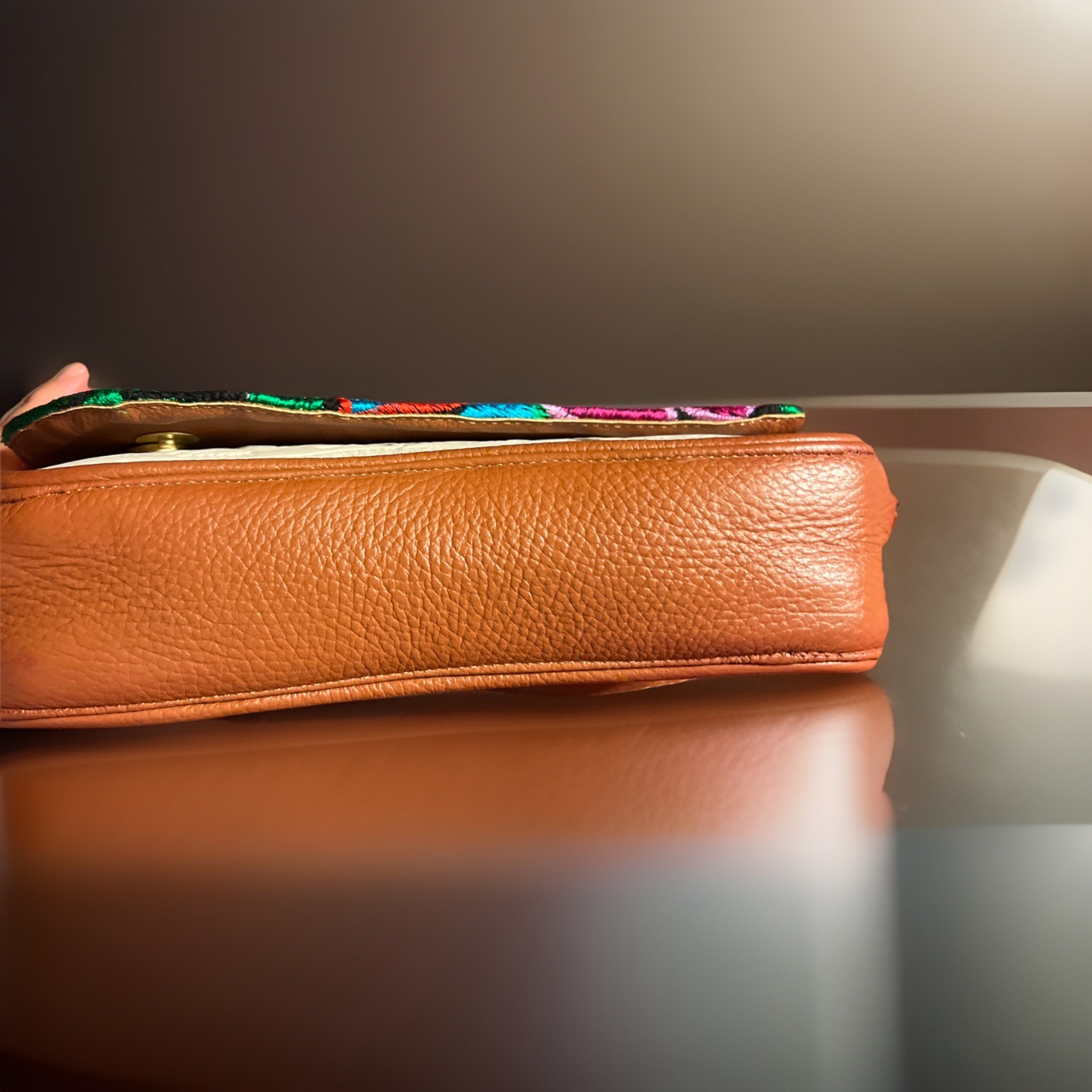 Artisan made vibrant, hand-embroidered floral & tooled design. Crossbody