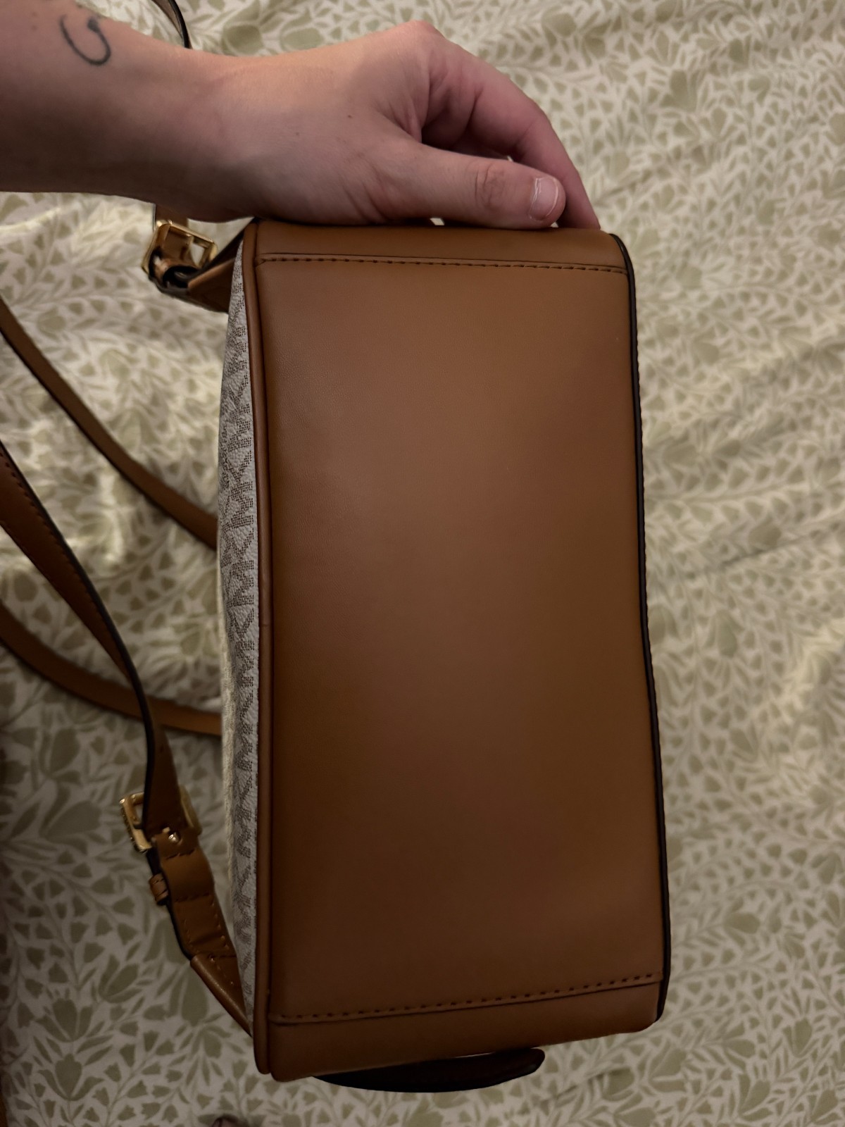 Michael Kors Backpack Great Condition. 2 Large Pockets and 2 small pockets.