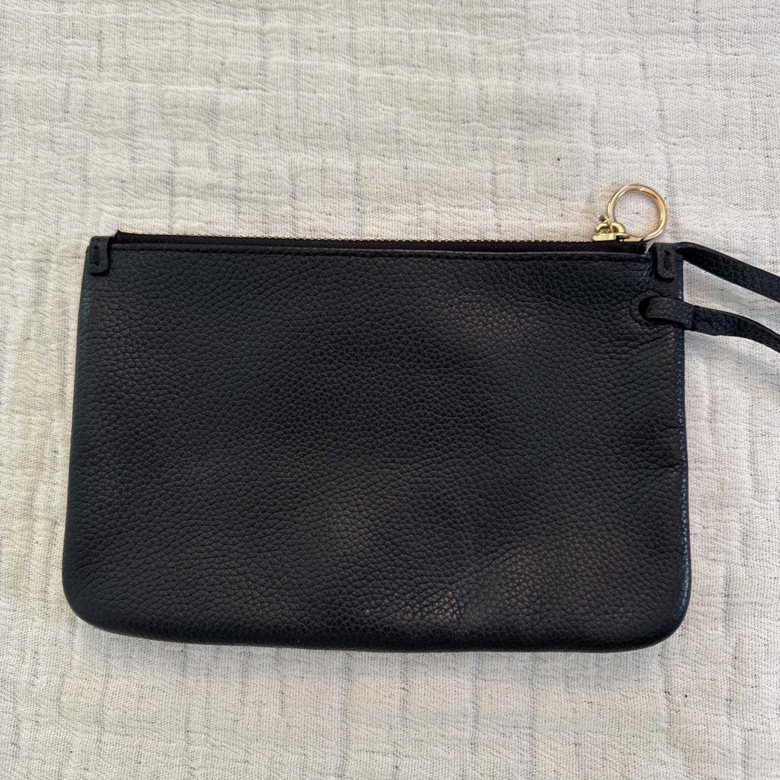 Tory Burch Perry Bombe wristlet in black pebbled leather