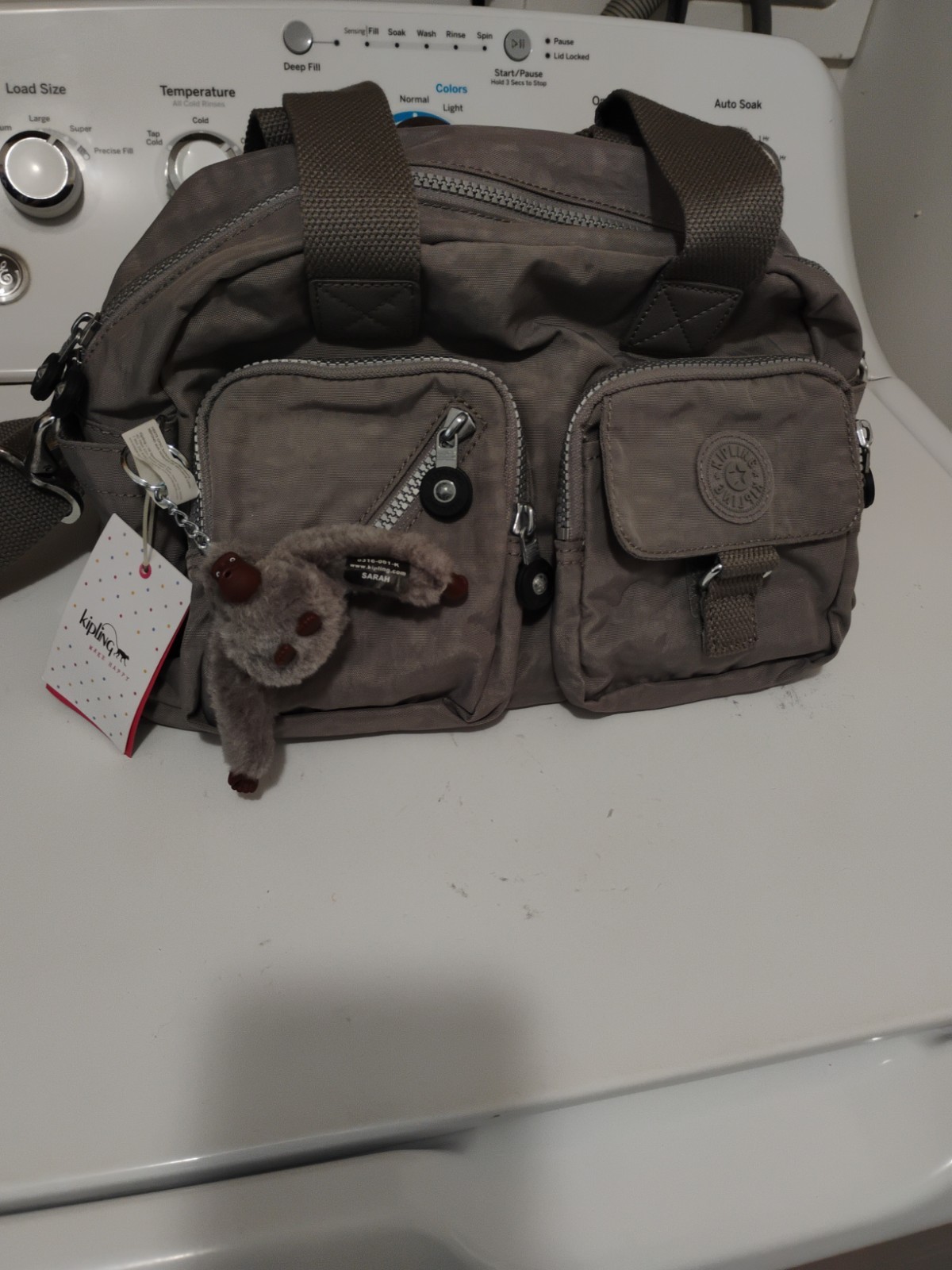 New With Tags Kipling Medium Crossbody Bag Grey W/Make Me Happy Monkey Keychain
