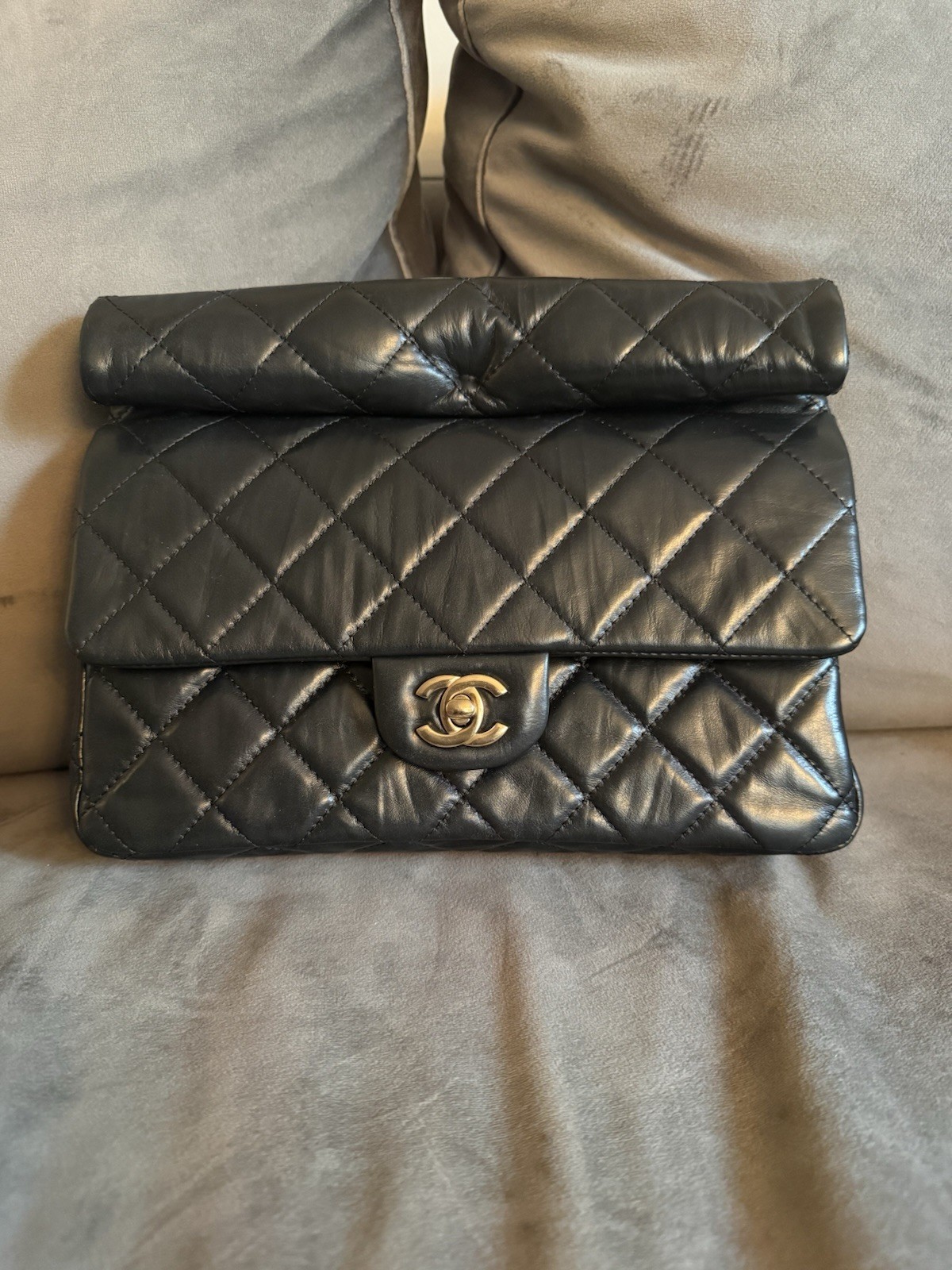 Chanel Black Medium Quilted Lambskin Roll Clutch