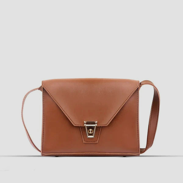 Brand New womens Stylish LeatherLight weight Brown handbag in original packaging