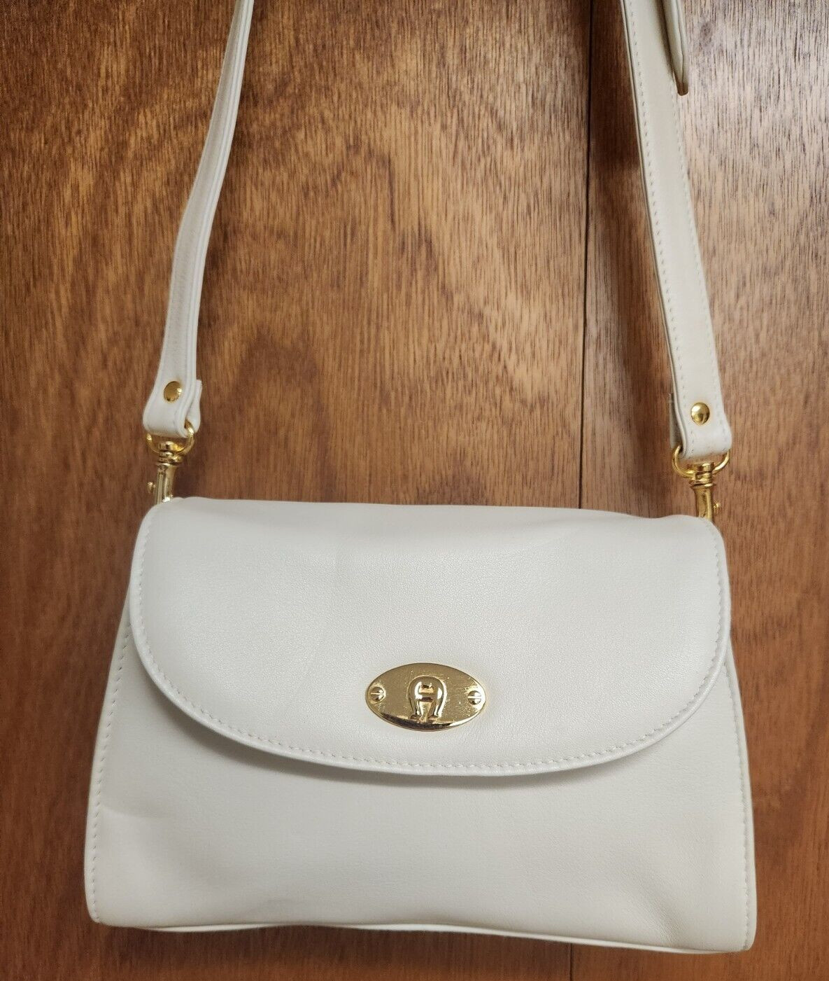 Etienne Aigner Leather Ivory Handbag with Crossbody Adustable Strap Gold Accents