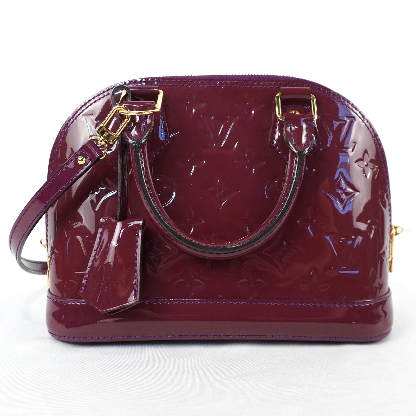 Louis Vuitton Vernis Monogram Alma BB Handbag In Burgundy With Gold Hardware