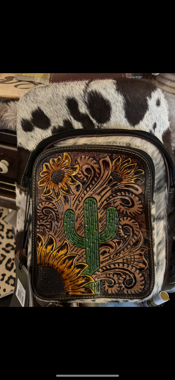 myra hair on hide sling. Tooled leather SUNFLOWER and CACTUS design