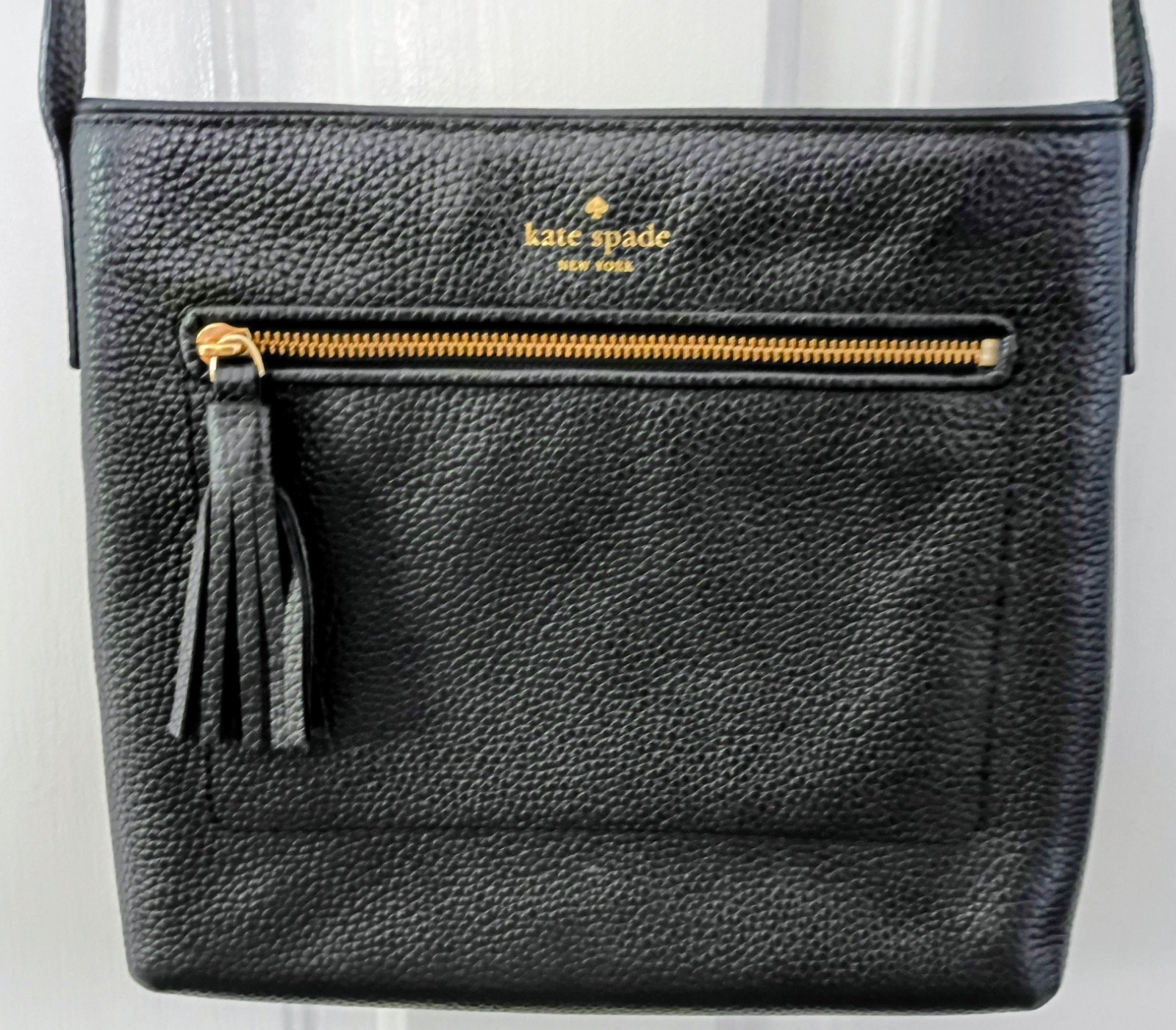 kate spade new york Black Pebbled Crossbody Bag Tassel Zip Pockets Gold