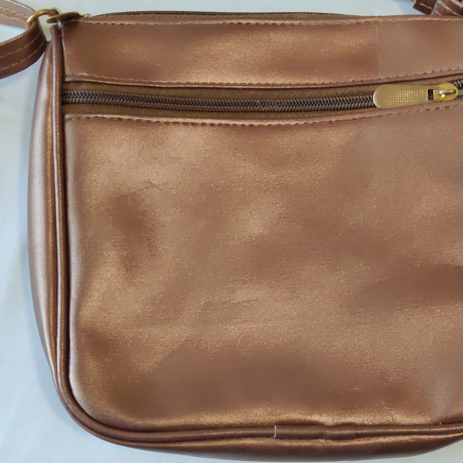 Women’s Bronze Metallic Crossbody Bag Zip Closure Outer Pockets Lined Gold Charm