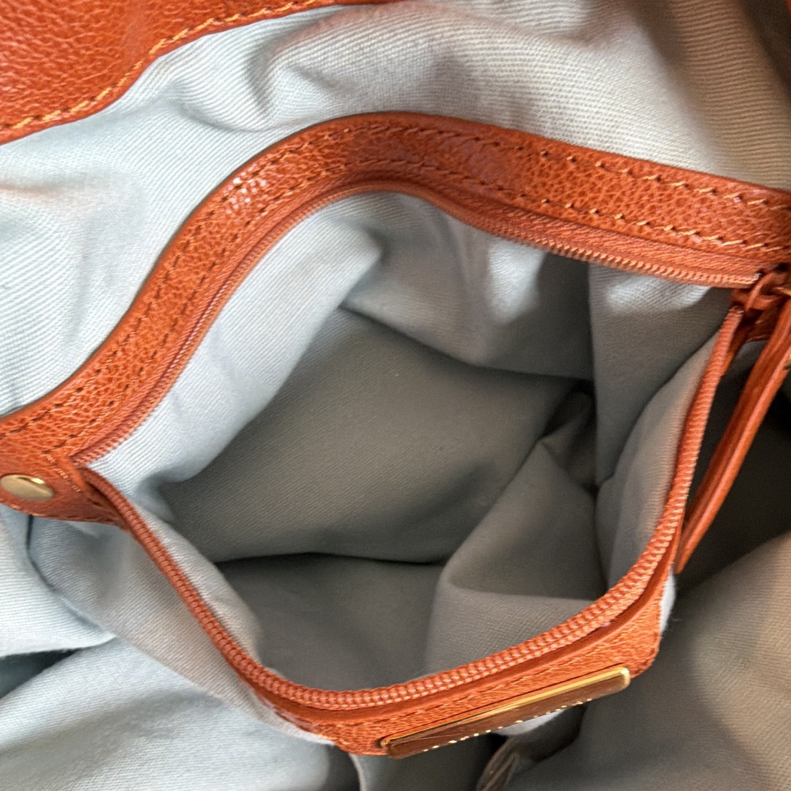 Isabella  Fiore Brown Studded Leather Drawstring Shoulder Bag – Tasseled Strap
