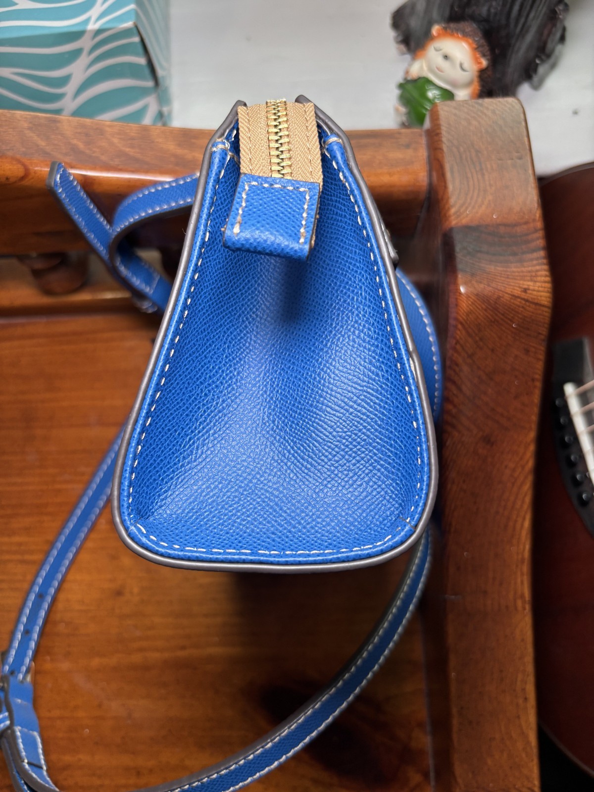 Dooney & Bourke Pebbled Leather Small Janine Crossbody in the color French Blue.