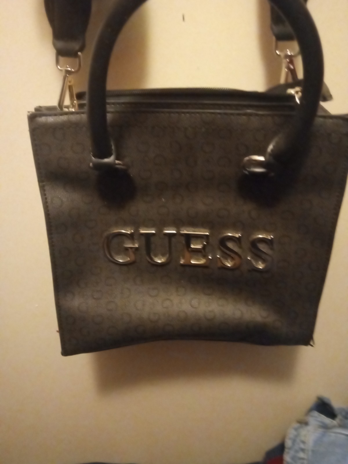 guess handbags women used dark gray with beige interior has guess written on str