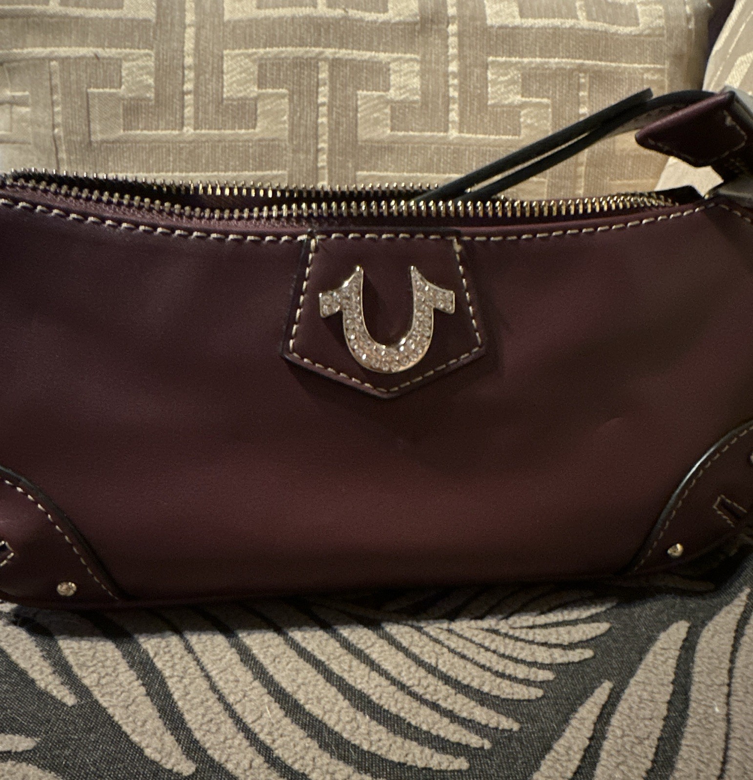 True Religion wine color with Rhinestone Logo Zip Shoulder Bag