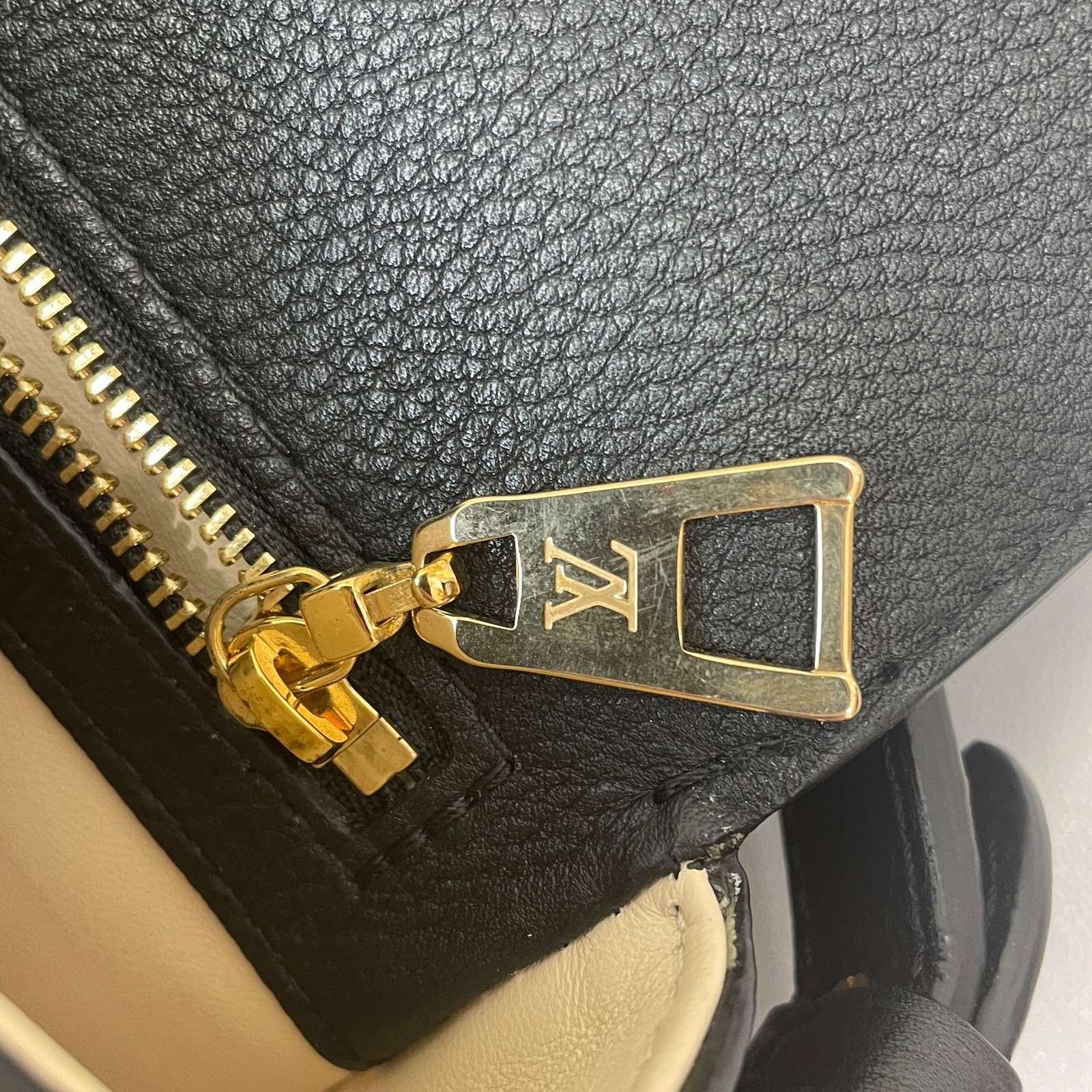 Louis Vuitton Pont 9 black calfskin crossbody bag with gold-tone hardware.