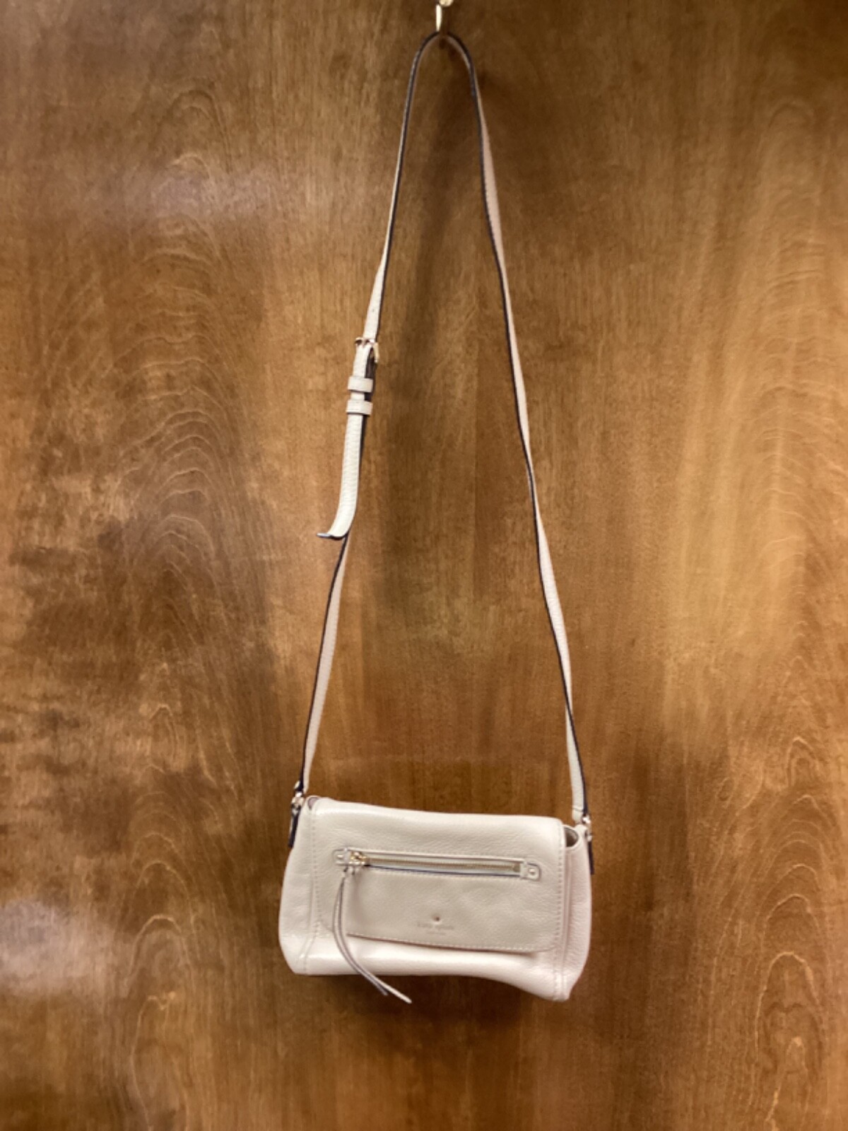 Women “Kate. Spade” sandlewood color small shoulder bag. P.O.