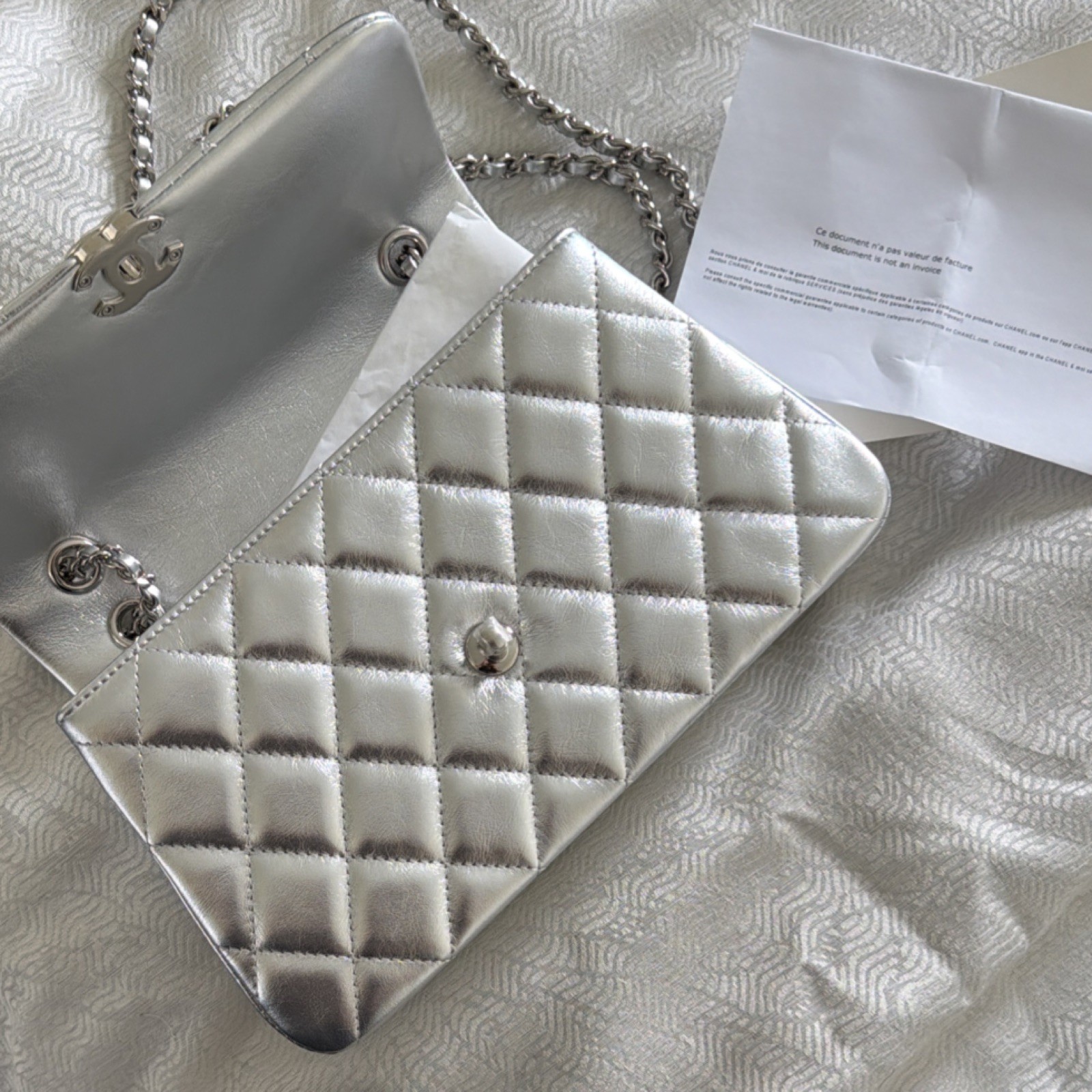 AUTHENTIC CHANEL 25p flap bag in silver