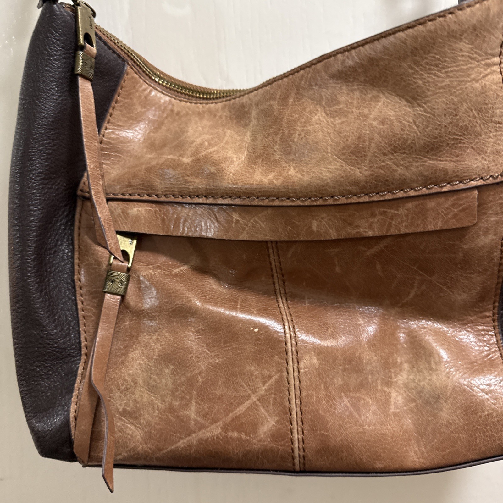 The Sak Indio Two Tone Brown Leather Alameda Purse Snake Skin Pattern Strap