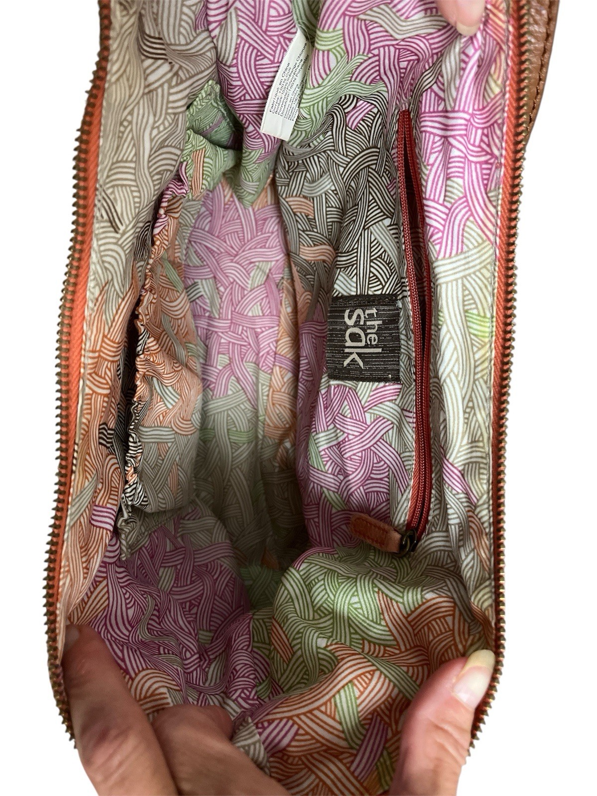 The Sak Orange And Tan Leather Shoulder Bag with Logo Tag and Silver Line Trim