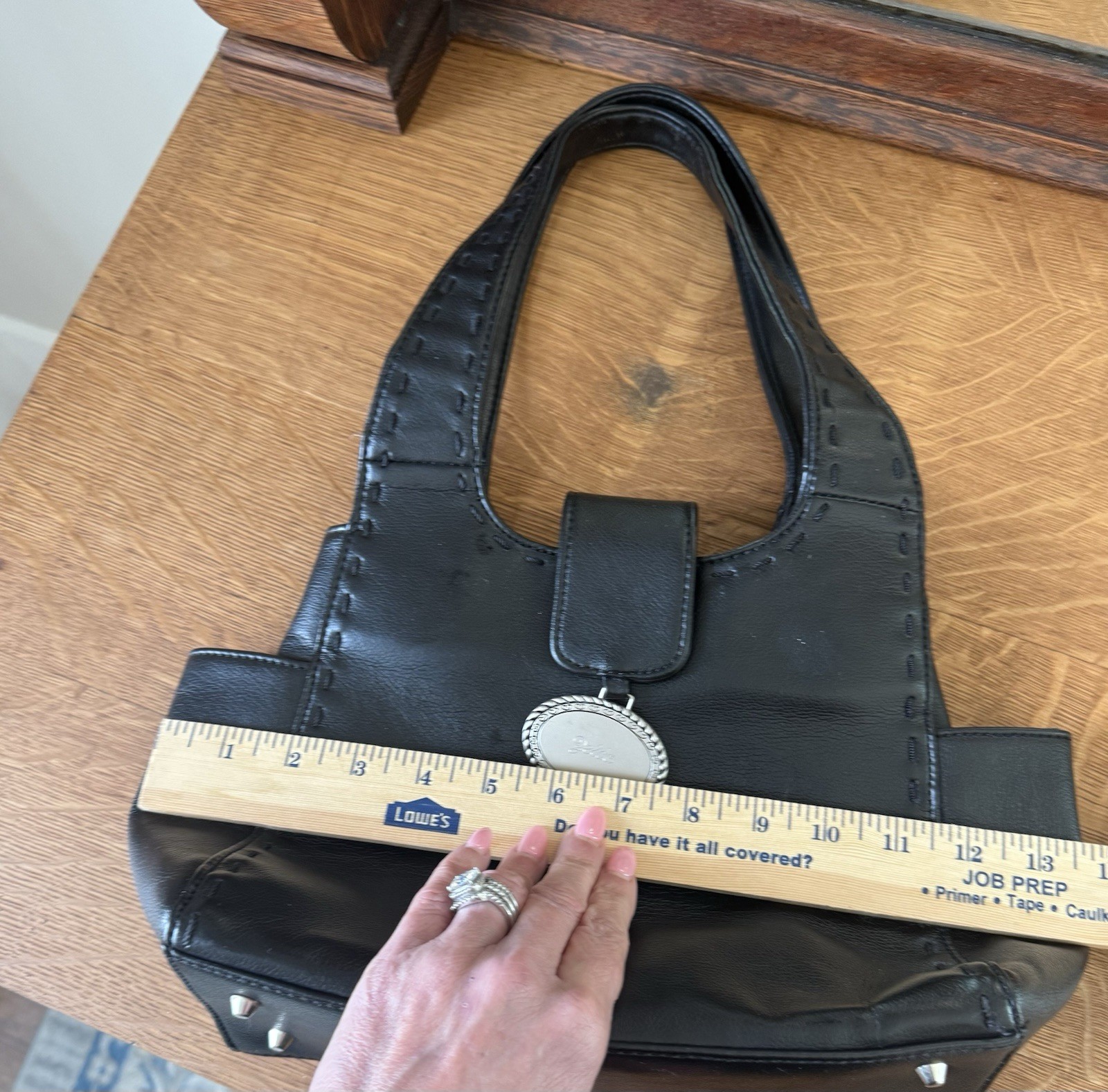Zelda Handbag Vegan Leather Black Whipstitch EUC Waterbottle Pockets Footed